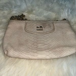 Cream coach wristlet